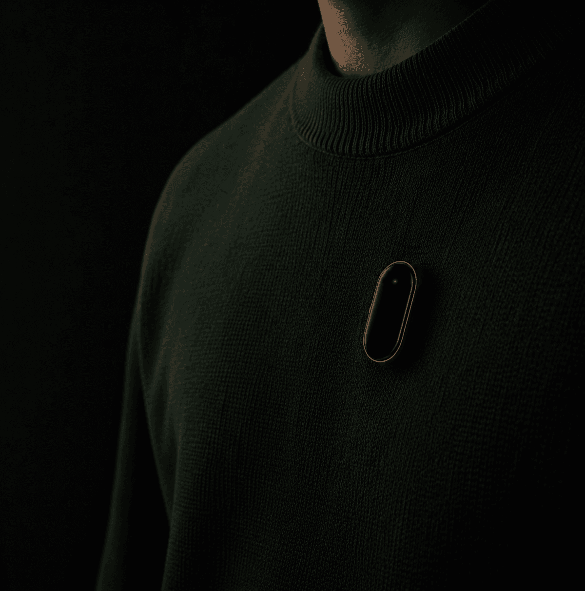 Trace clipped to a sweater